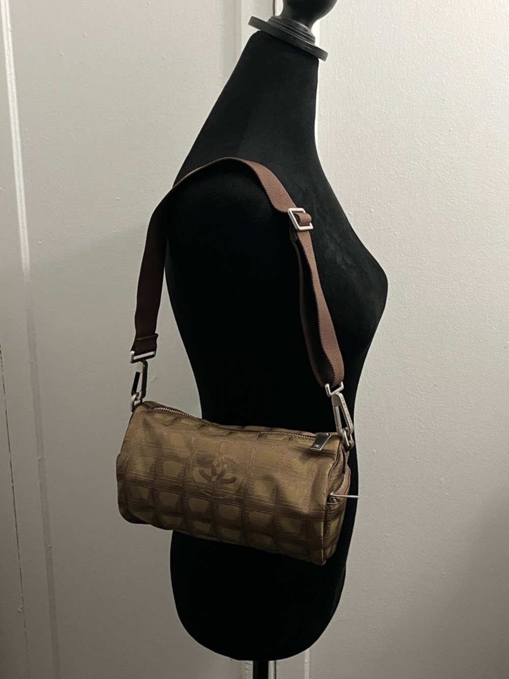 Chanel New Travel Line Mini Roll or Barrel Bag in a khaki or olive green color